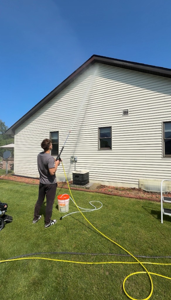 Pressure washing siding and exterior surfaces